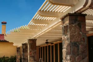 White Pergolas Contrasted with Stone