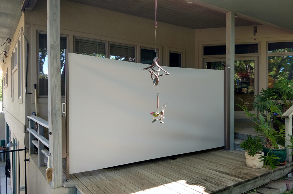 Horizontal Retractable Shades on Porch Privacy Shades