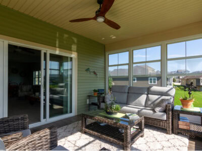 A nicely decorated 3 season sunroom photo. Photo taken on a beautiful Spring day.